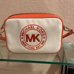 Michael Kors Orange and Cream crossbody bag